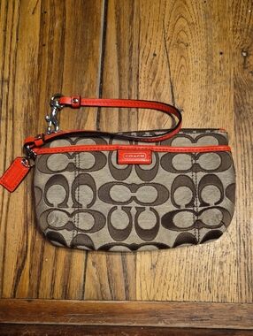 Coach Brown Signature Wristlet with Orange Trim